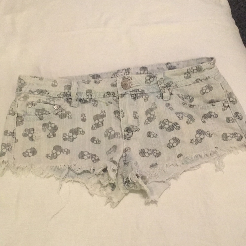 light blue cutoff jean shorts with pattern